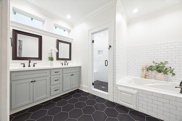 bathroom featuring vanity, tile patterned flooring, crown molding, and plus walk in shower