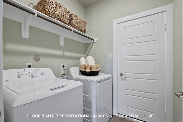 laundry room featuring laundry area and washing machine and clothes dryer