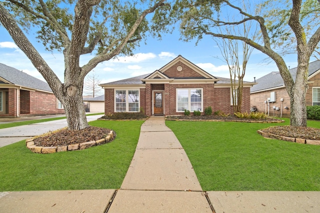 ranch-style home with a garage and a front lawn