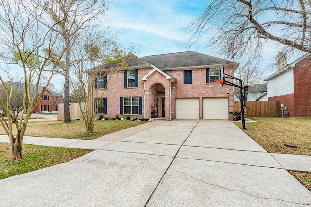 view of front facade featuring a garage and a front lawn