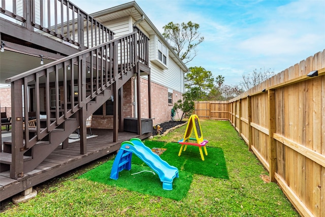 view of yard with a wooden deck