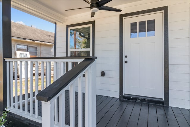 entrance to property featuring ceiling fan