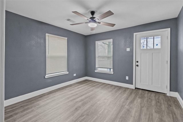 entryway featuring ceiling fan and light hardwood / wood-style flooring