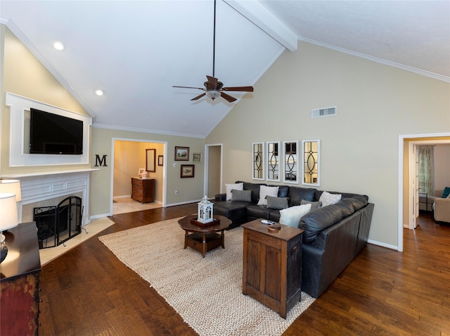 living room with high vaulted ceiling, ornamental molding, ceiling fan, beam ceiling, and hardwood / wood-style floors