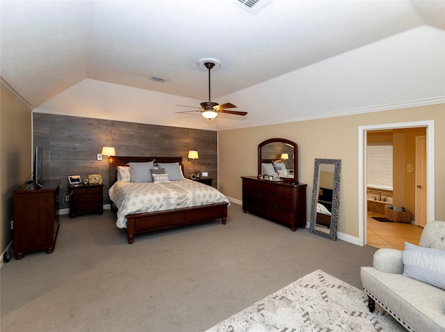 carpeted bedroom featuring ceiling fan, ornamental molding, wooden walls, and vaulted ceiling