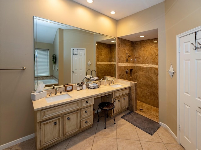 bathroom with vanity, plus walk in shower, and tile patterned flooring