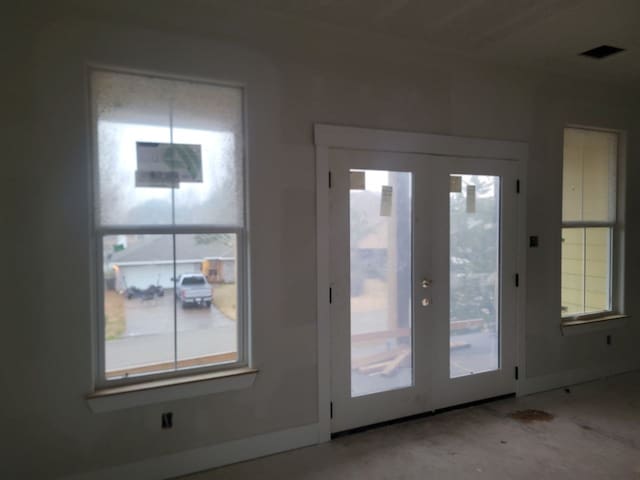 doorway featuring french doors