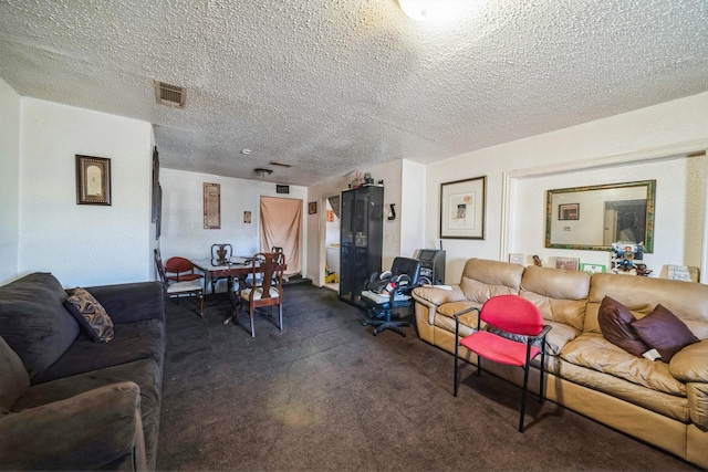 living room with dark carpet and a textured ceiling