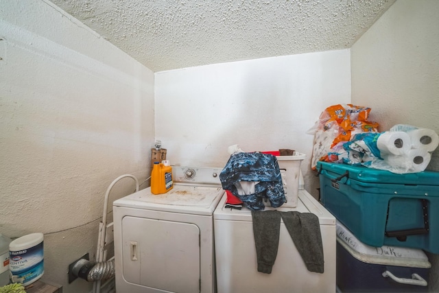 laundry area featuring washing machine and dryer