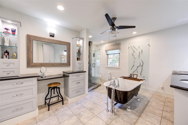 bathroom featuring vanity, tile patterned flooring, shower with separate bathtub, and ceiling fan