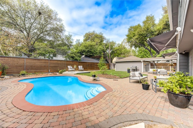 view of pool featuring a patio area