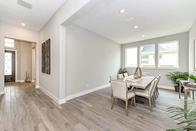 dining space featuring light hardwood / wood-style flooring