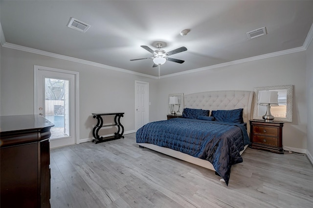 bedroom featuring crown molding, ceiling fan, and light wood-type flooring