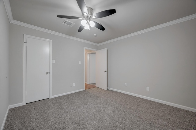 unfurnished bedroom with ceiling fan, ornamental molding, and carpet flooring