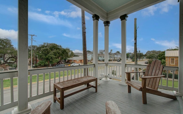 1209 Rosenberg St, Galveston, TX 77550 - wooden deck featuring a residential view
