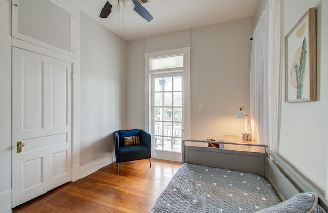 1209 Rosenberg St, Galveston, TX 77550 - bedroom with wood finished floors and ceiling fan