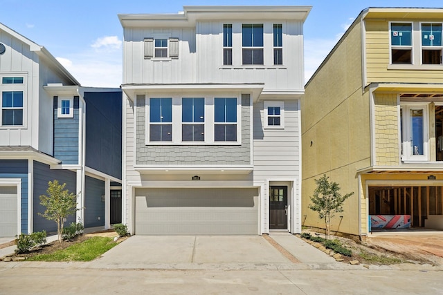 5613 Iris Harvest Ln, Houston, TX 77091 - view of front of property featuring an attached garage and concrete driveway