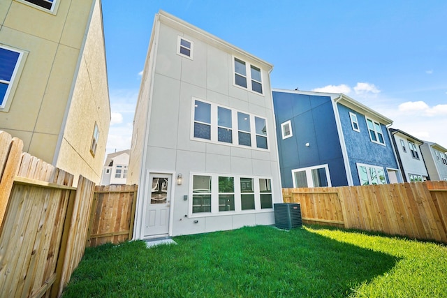 5613 Iris Harvest Ln, Houston, TX 77091 - rear view of property with cooling unit and stucco siding
