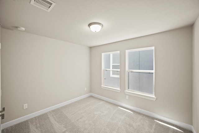 5613 Iris Harvest Ln, Houston, TX 77091 - unfurnished room with carpet floors and baseboards