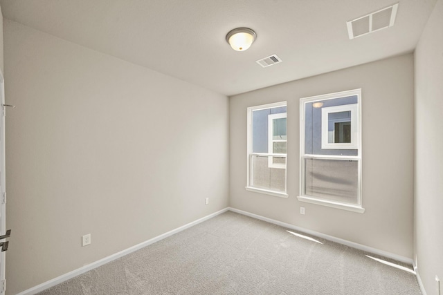 5613 Iris Harvest Ln, Houston, TX 77091 - carpeted empty room featuring baseboards