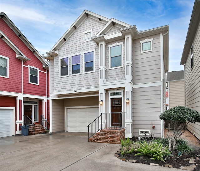 view of front of property with a garage