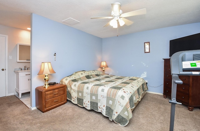 bedroom with carpet, visible vents, ceiling fan, and baseboards