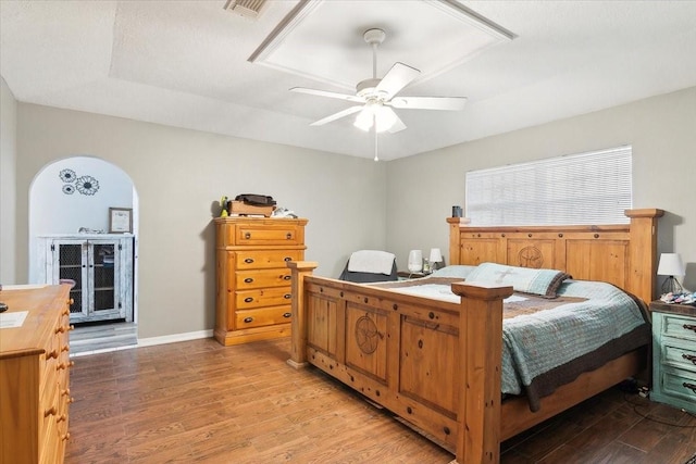 bedroom featuring hardwood / wood-style floors and ceiling fan