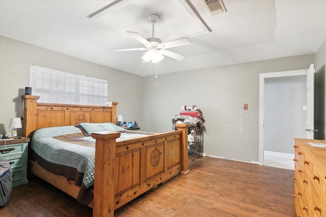 bedroom featuring ceiling fan and wood-type flooring