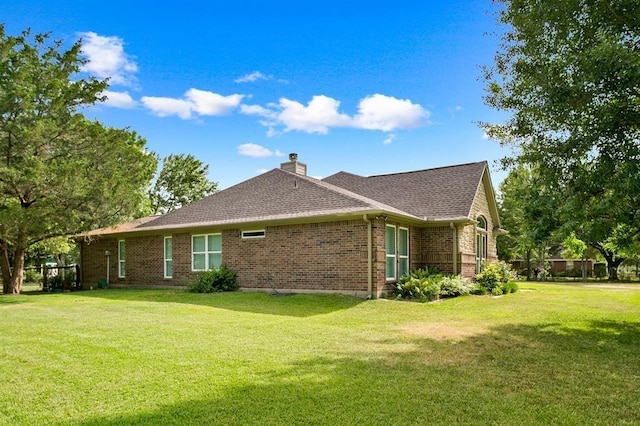 view of home's exterior featuring a yard