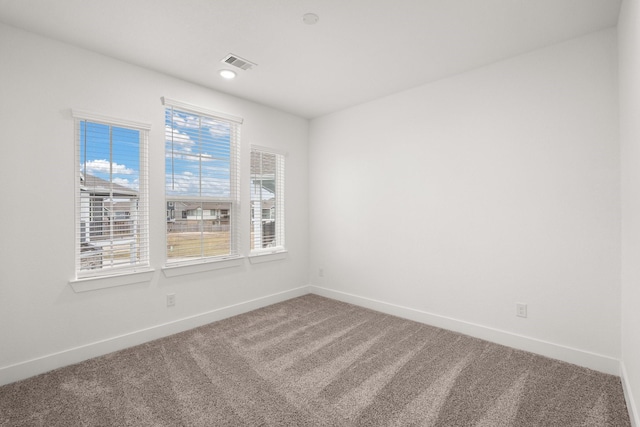 view of carpeted spare room