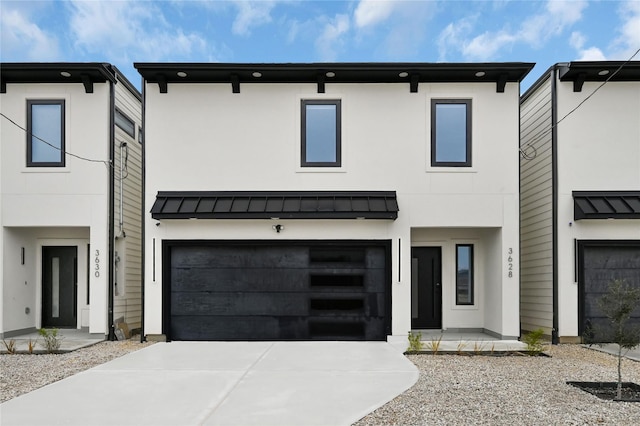 contemporary home with a garage