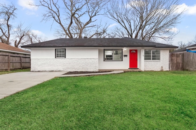 single story home featuring brick siding, a front lawn, and fence