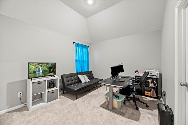 carpeted office with vaulted ceiling