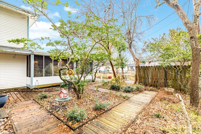 view of yard with a sunroom