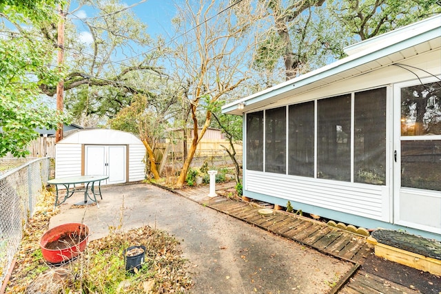 view of patio with a storage unit