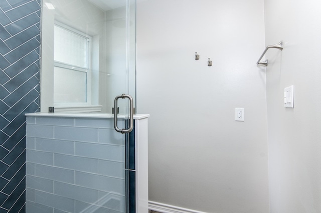 bathroom featuring walk in shower