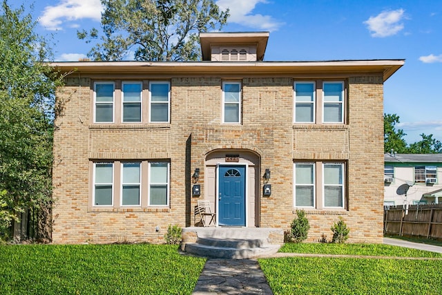 view of front of house with a front lawn