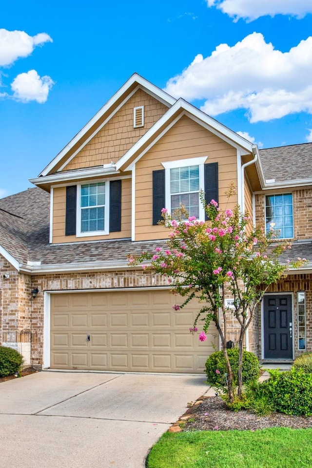 view of front of property featuring a garage