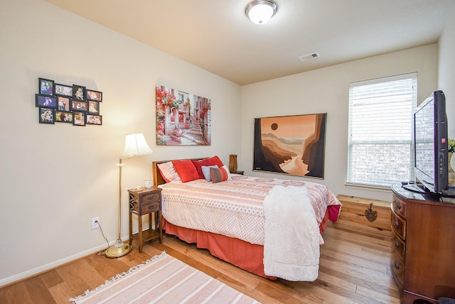 bedroom featuring light hardwood / wood-style floors