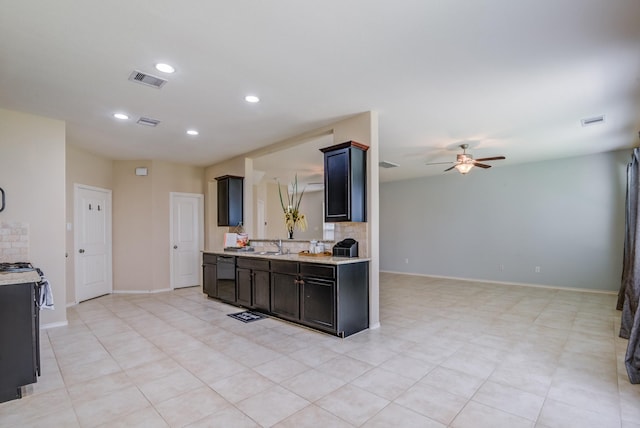 kitchen with electric stove, sink, dishwasher, ceiling fan, and decorative backsplash