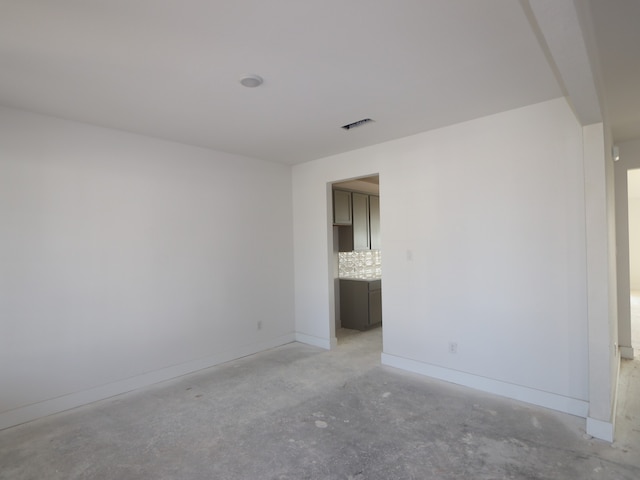8411 Oceanmist Cove Dr, Cypress, TX 77433 - empty room with concrete flooring and baseboards