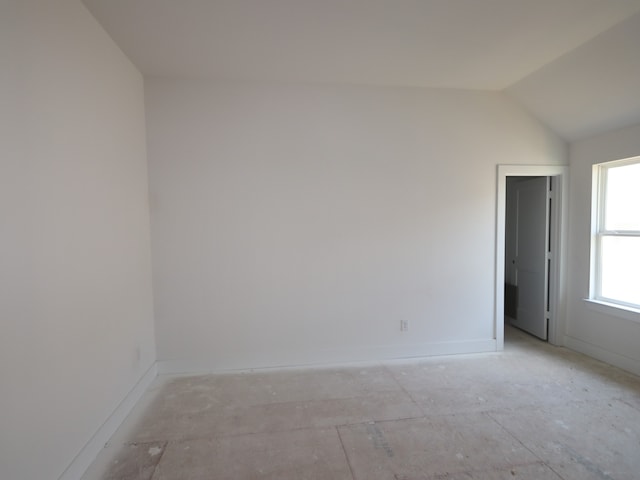 8411 Oceanmist Cove Dr, Cypress, TX 77433 - spare room with baseboards and vaulted ceiling