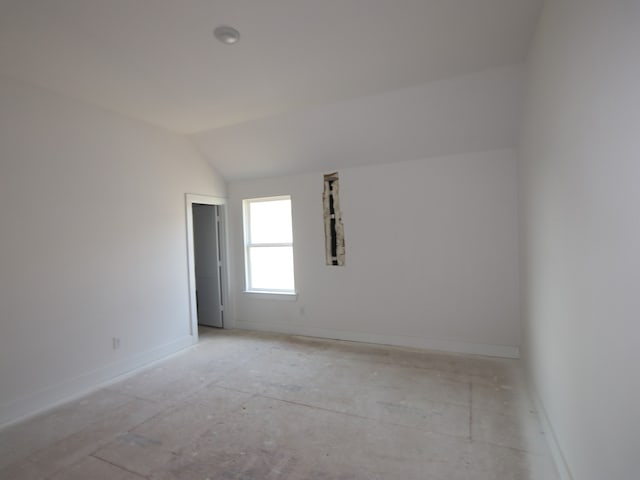 8411 Oceanmist Cove Dr, Cypress, TX 77433 - unfurnished room with lofted ceiling and baseboards