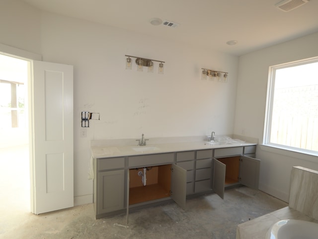 8411 Oceanmist Cove Dr, Cypress, TX 77433 - bathroom featuring a sink and a bath