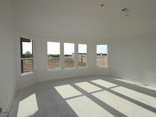 8411 Oceanmist Cove Dr, Cypress, TX 77433 - spare room with concrete flooring and baseboards