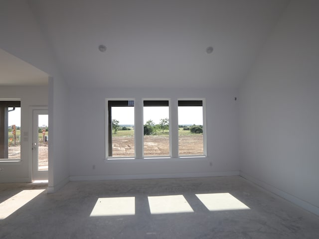 8411 Oceanmist Cove Dr, Cypress, TX 77433 - unfurnished room featuring plenty of natural light, vaulted ceiling, and baseboards