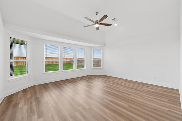 8411 Oceanmist Cove Dr, Cypress, TX 77433 - unfurnished room featuring light wood finished floors, lofted ceiling, and ceiling fan