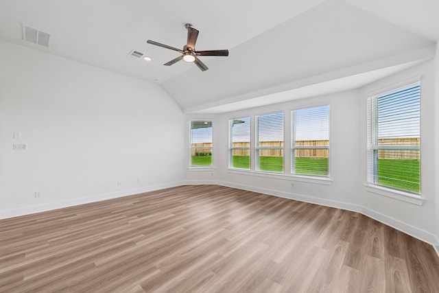 8411 Oceanmist Cove Dr, Cypress, TX 77433 - unfurnished room with lofted ceiling, plenty of natural light, light wood-type flooring, and ceiling fan