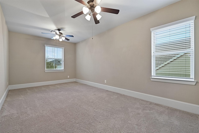 spare room with light carpet