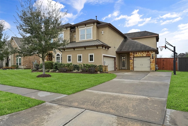 front facade featuring a garage and a front lawn